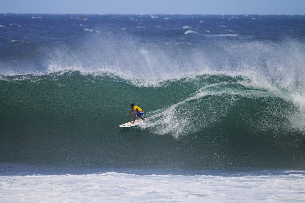 Marco Giorgi of Uraguay (pictured) posting one of the highest rides of the day, a 9.30 (out of a possible 10.00) to advance into the next round at the Vans World Cup of Surfing on Saturday November 28, 2015.