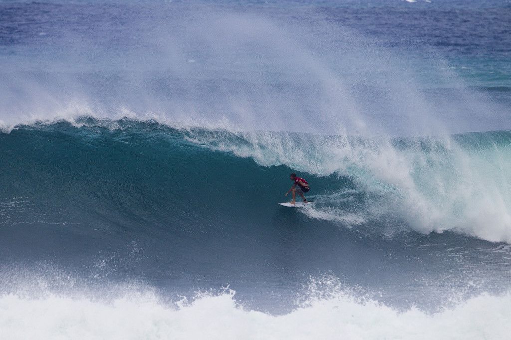 Mick Fanning of Australia (pictured) advancing through Round 3 in second place at the Vans World Cup of Surfing at Sunset Beach on Oahu, Hawaii on Wednesday December 2, 2015.